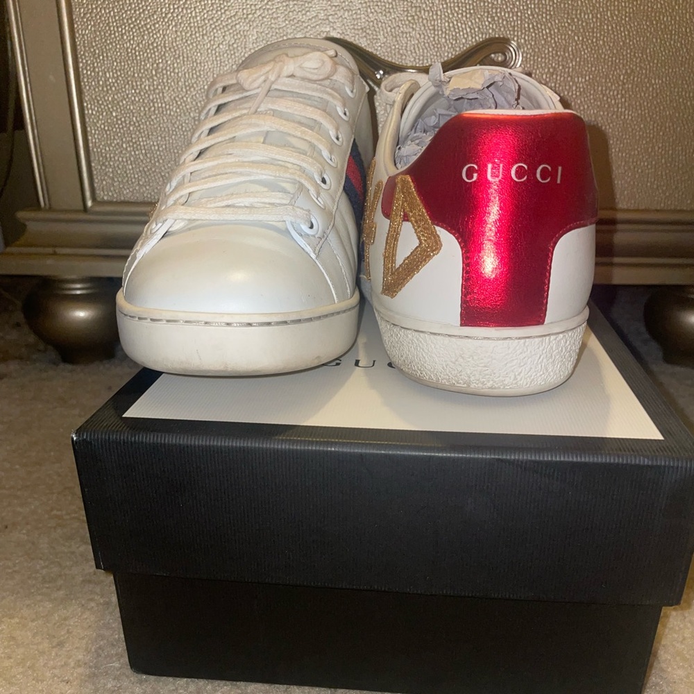 Red/white/Navy blue/gold gently used authentic Gucci  sneakers